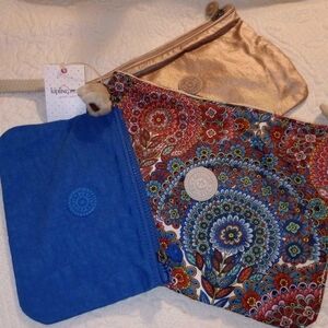 Kipling Multicolor Floral and Blue Pouches